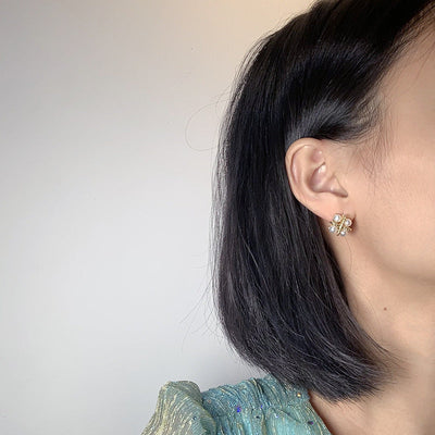 Four Natural Freshwater Pearl Earrings
