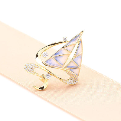 Two-tone sailing brooch