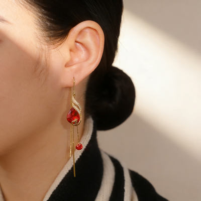 Ruby Peacock Tassel Earrings