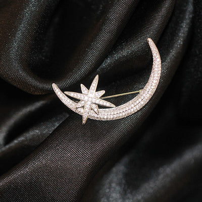 Star and moon brooch