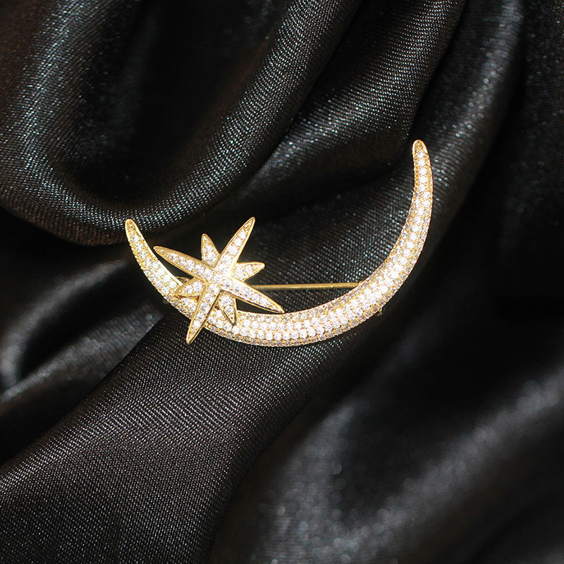 Star and moon brooch