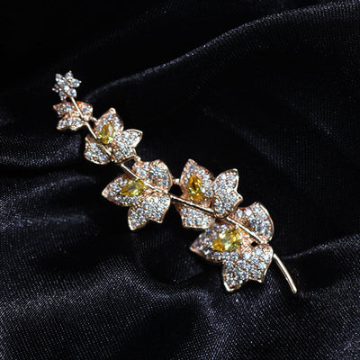 Yellow floral brooch