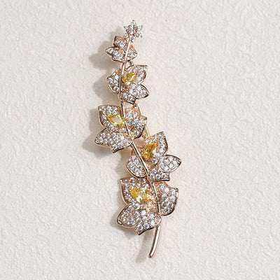 Yellow floral brooch