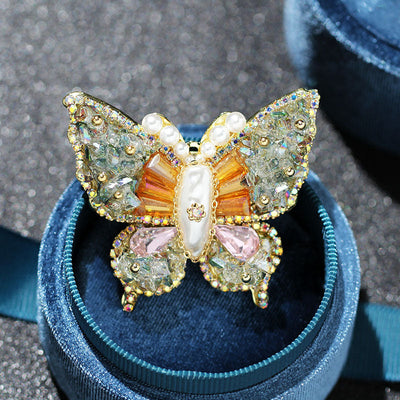 Butterfly faceted natural crystal brooch