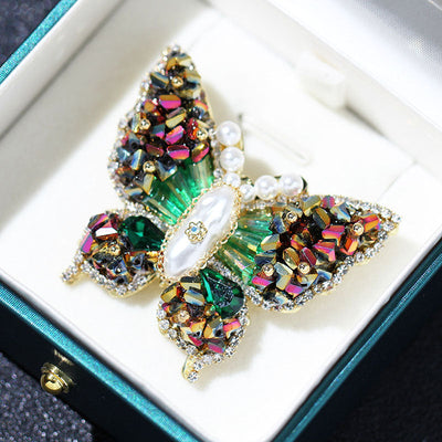 Butterfly faceted natural crystal brooch