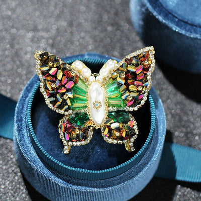 Butterfly faceted natural crystal brooch