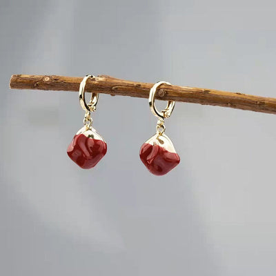 Red oil drop ball earrings