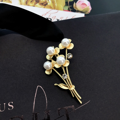 Gold December Birthday Flower Brooch