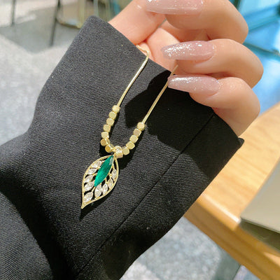 Zircon tree leaf pendant