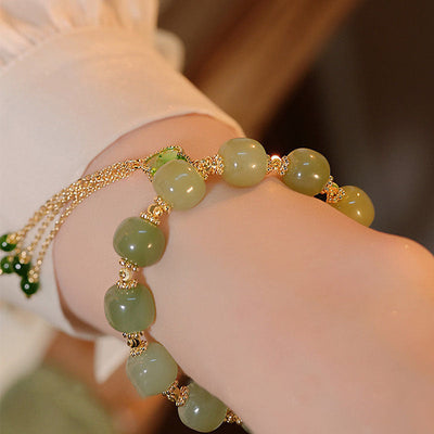 Four-leaf clover • Tassel Red agate bracelet