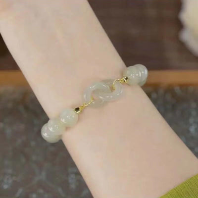 Interlocking circles • Emerald Jade stone bracelet