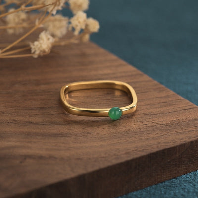 Square metal ring with chalcedony