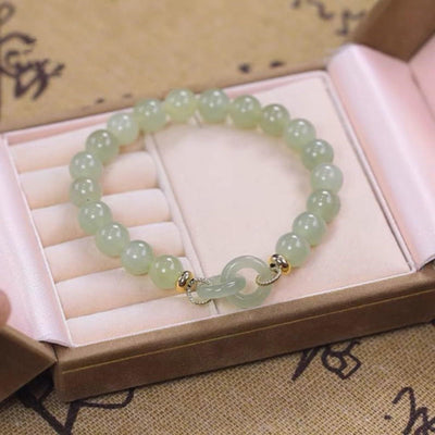 Interlocking circles • Emerald Jade stone bracelet