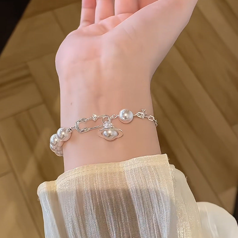 Saturn Orbits • Pearl Bracelet